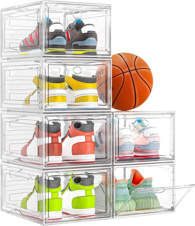 Clear shoe boxes stacked beside a basketball