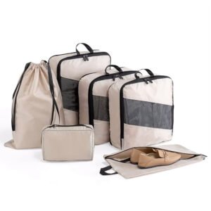 Travel packing cubes with compression