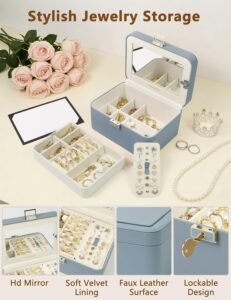 Open jewelry box with mirror and separate accessory compartments