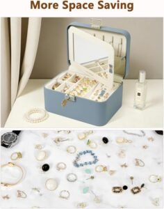 Jewelry box with mirror and organized compartments on a dressing table