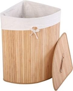 Open bamboo laundry basket with its lid placed beside it