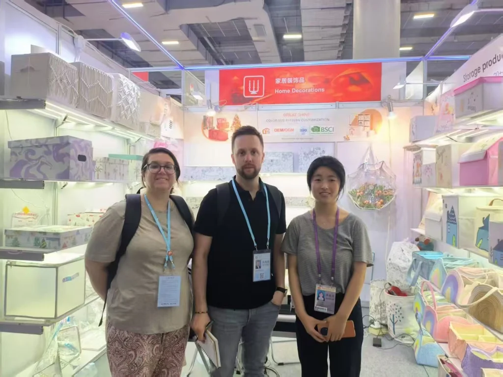 Great Shine team meeting buyers at a storage products exhibition booth