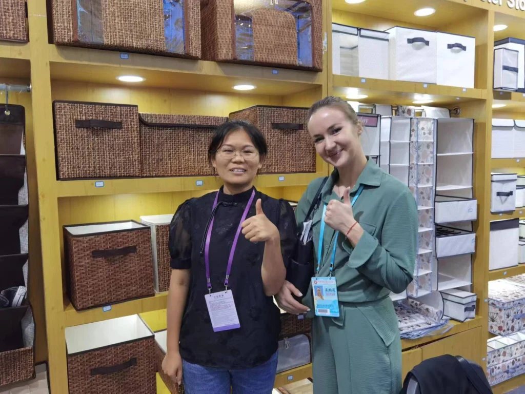 Great Shine representative with a buyer beside fabric storage displays