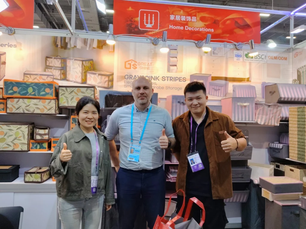 Great Shine team with a retail buyer at a storage products exhibition