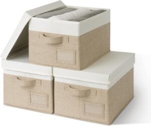 Beige storage boxes with white lids and front handles