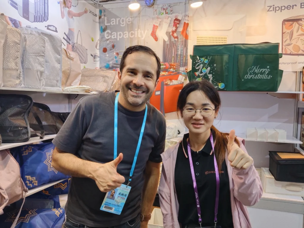 Great Shine representative meeting a buyer at a trade show booth