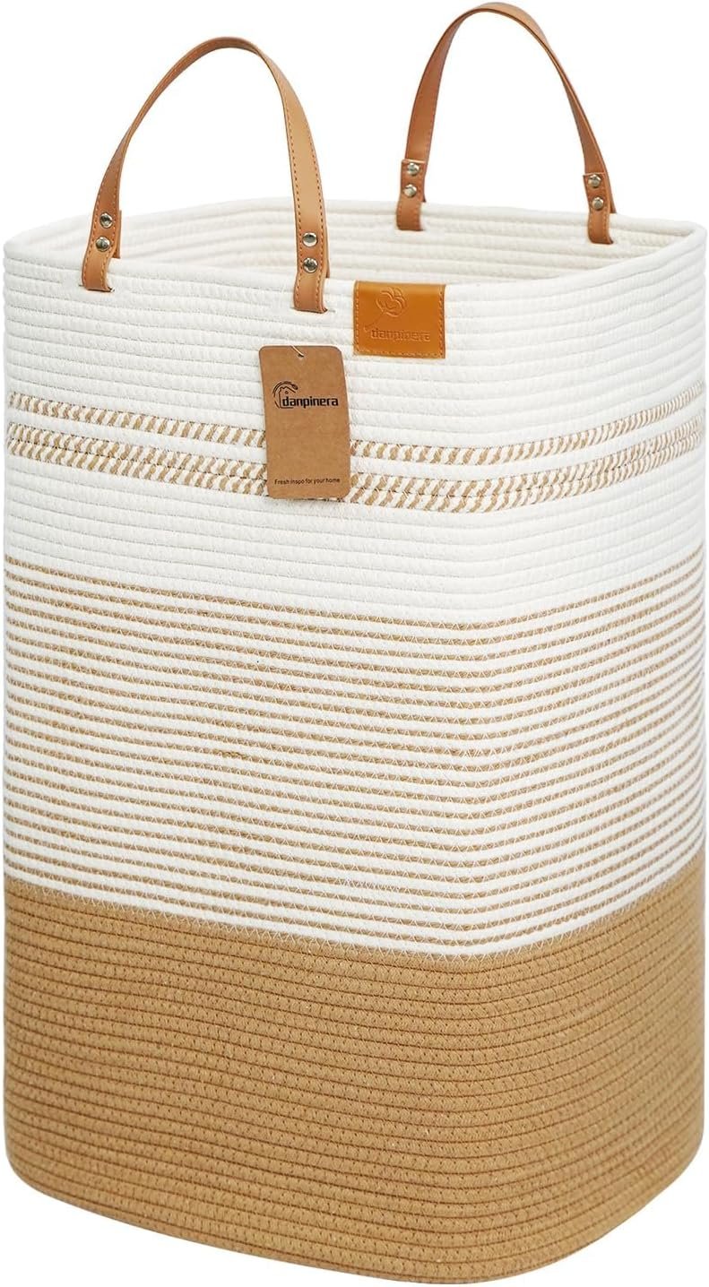 Cream and tan laundry hamper with carrying handles
