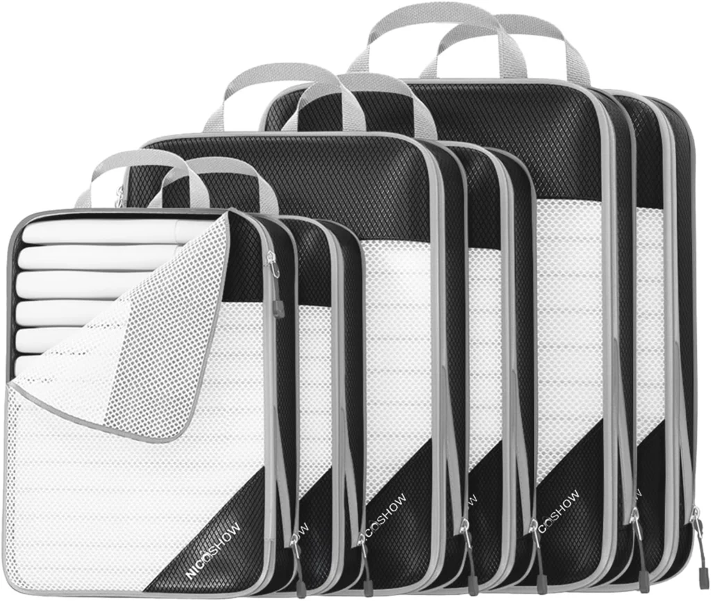 White packing cubes with black trim and mesh panels