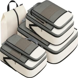 Packing cubes arranged inside an open suitcase