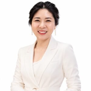 Portrait of a woman wearing a white jacket
