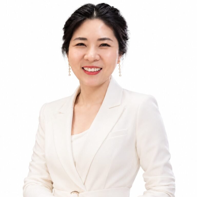 Portrait of a woman wearing a white jacket