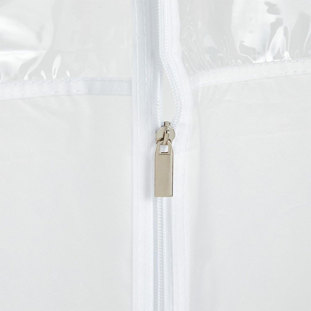 Close-up of zipper assembly on a white garment cover showing nylon coil teeth, metal pull, and double-row stitching