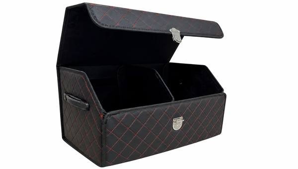 Black diamond-quilted storage box with a lid and front clasp