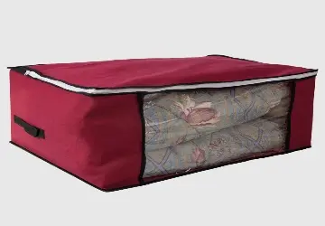 Reference image of a low-profile bedding bag with a clear front panel